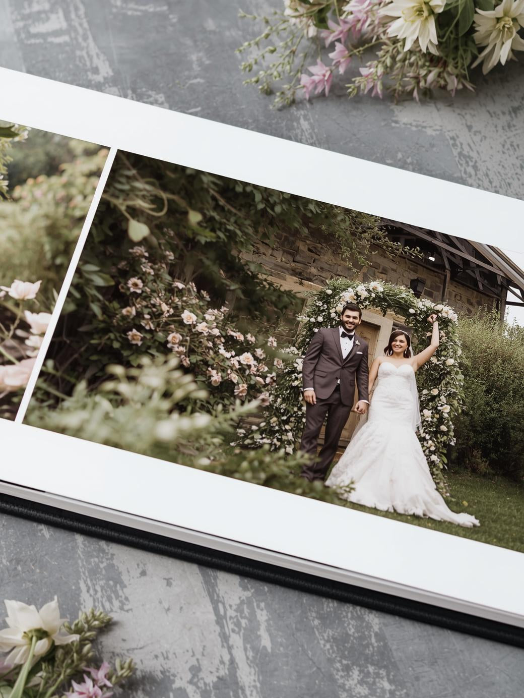 Wedding photo album with a couple in a garden setting